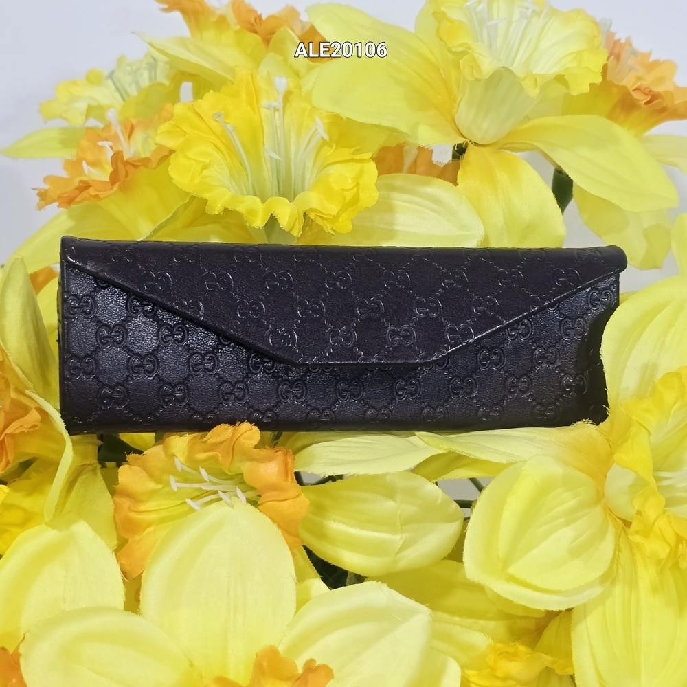 Gucci Brown Vintage pyramid Sunglass case Gucci monograms leather engraved.